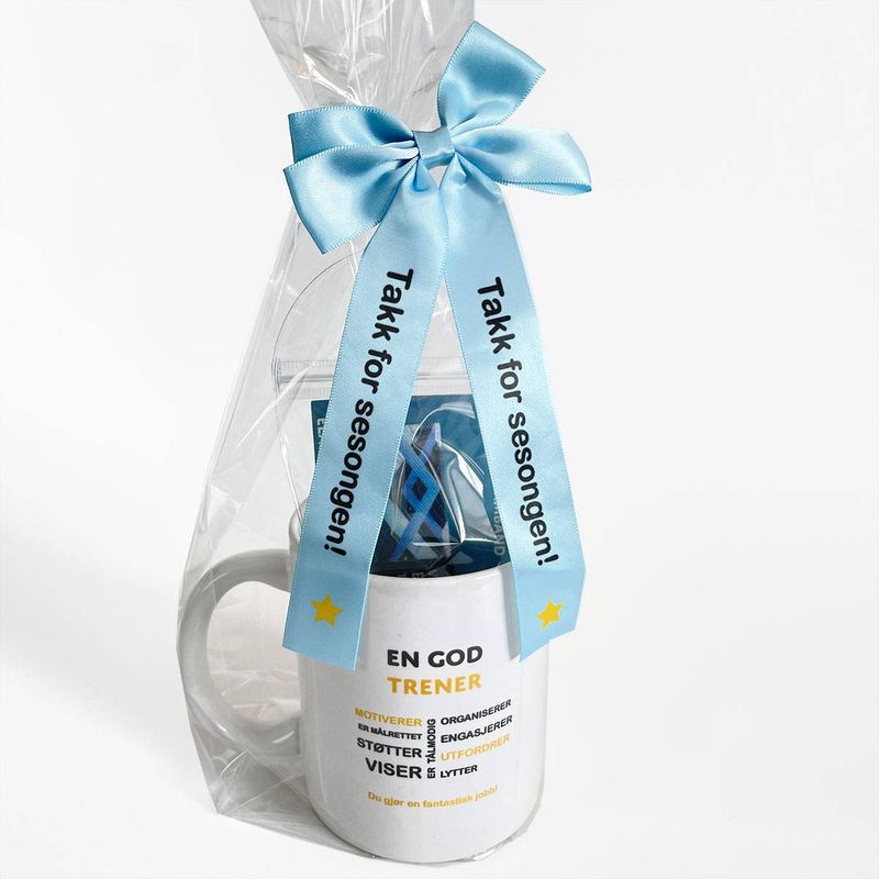 Kopp og armbånd til 'En god trener'